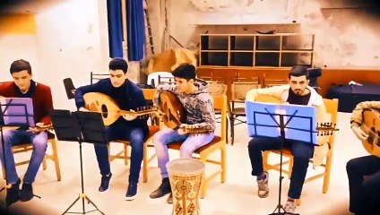 A group music performance class for students on the oud instrument