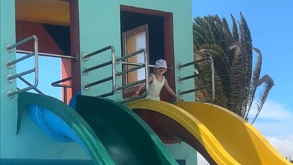 Girl changes her mind about water slide... but it's too late!