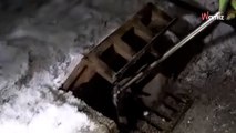Women hear  shocking sound coming from manhole: Moments later help arrives