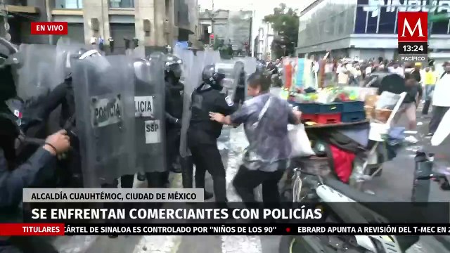 Comerciantes y policías se enfrentan en Eje Central y avenida Juárez, en CdMx
