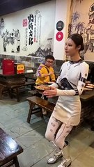 Robotic girl in china restaurant