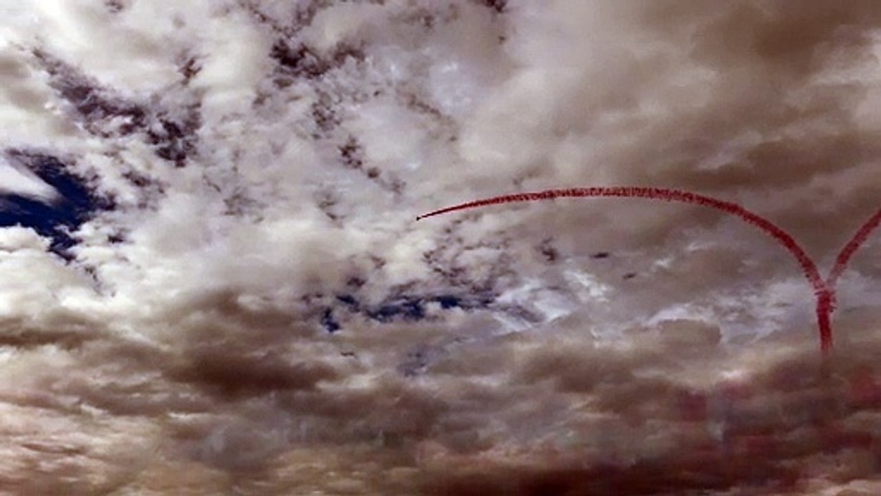Red Arrows create a love heart over Portsoy