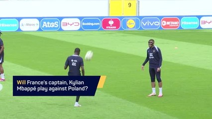 Kylian Mbappe is getting used to his new mask ahead of France's game against Poland
