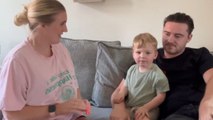 Parents involve excited toddler during intimate gender reveal for baby #2