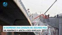 Se desprende una canaleta del Segundo piso del Periférico y afecta a dos vehículos