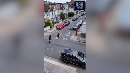 Two men seen fighting with Rambo knives on Cadoxton Avenue in Tottenham