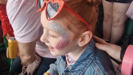 Appreciative 8 y/o Swiftie trembling with emotion while attending Eras Tour in Edinburgh