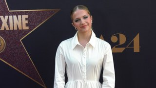 Indi Star attends the red carpet world premiere of 
