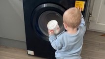 'Spin Cycle Startle' - Mom sneaks up on toddler fixated on washing machine