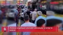 Otobüsü engelleyen otomobili vatandaşlar el birliği ile kaldırdı