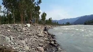 Live catch fish   by a fishing man at River khunar Balakot ###