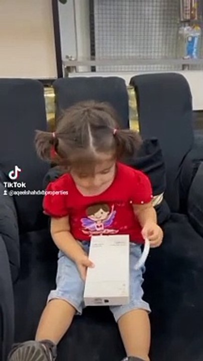 Cute Baby Unboxing Iphone