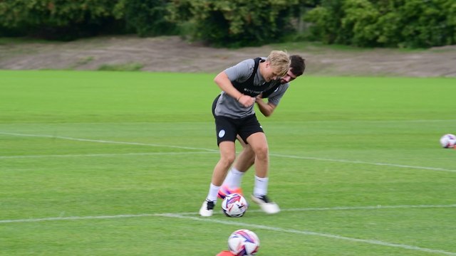 Wigan Athletic players pre-season training ballwork