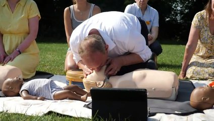 Ed Davey practices CPR on the campaign trail