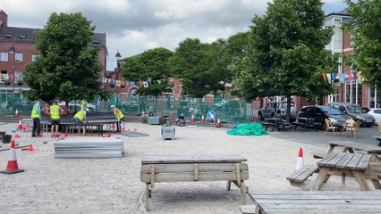 Putting up stage and seating in Crediton Town Square (Will Goddard, Crediton Courier)