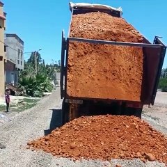 Dump Truck unloading mud