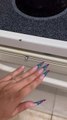 Manicurist Breaks Fingernail in Oven