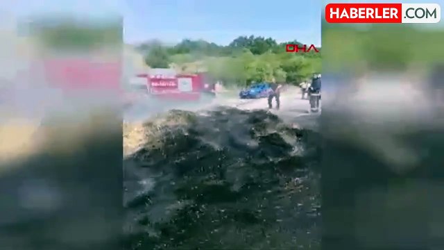 Keşan'da traktöre bağlı römorklardaki saman balyaları yandı