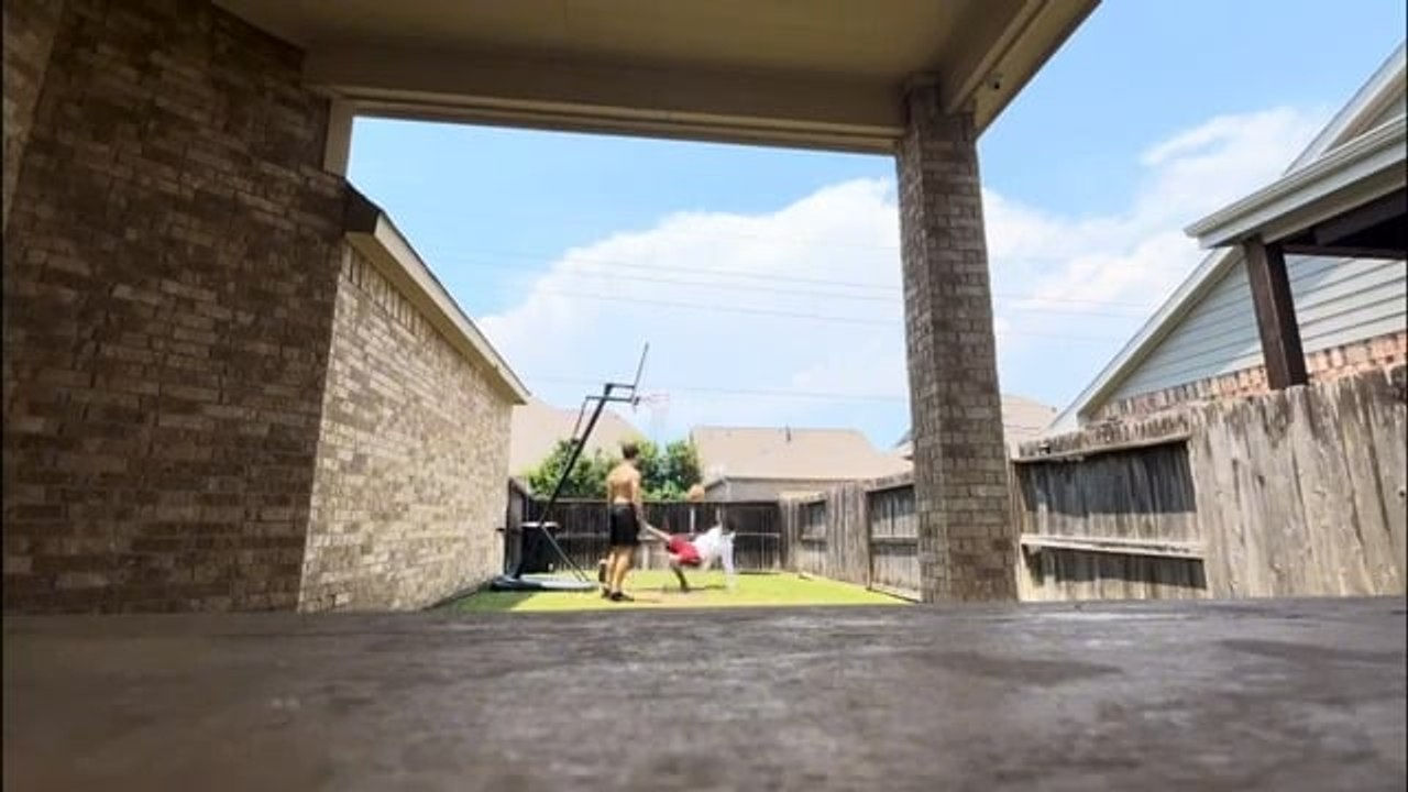 Boy Slips and Falls on Mud While Attempting Dunk