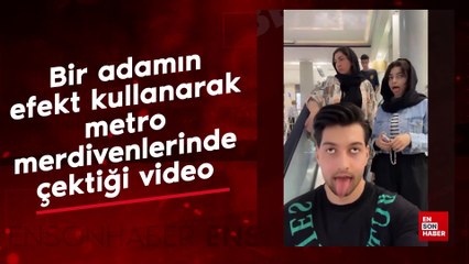 Bir adamın efekt kullanarak metro merdivenlerinde çektiği video