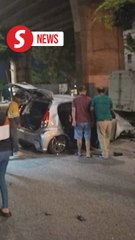 Man cheats death after car plunges 30m off flyover