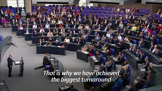 Germany's Scholz defends immigration policy in heated debate