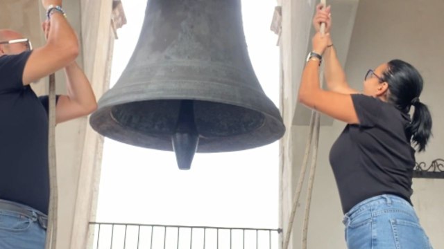 Joyful moment: Couple rings the bell in Mondella's historic church after rituals