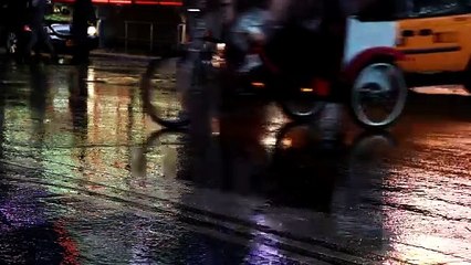mixkit-traffic-on-a-rainy-night-4331-full-hd