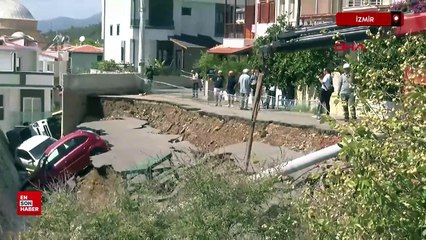İzmir'de 3 araç yıkılan istinat duvarının altında kaldı