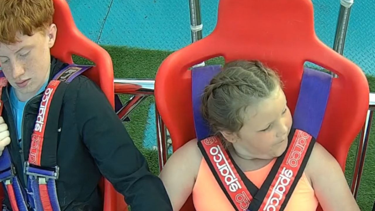 Fear turns into smiles: Little girl enjoys slingshot ride after overcoming fear