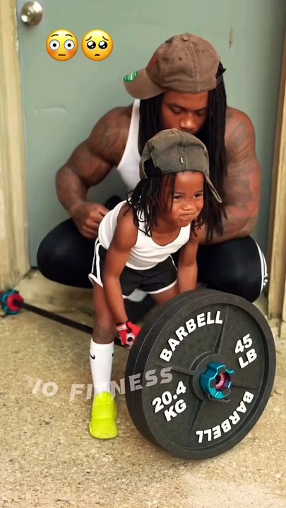 Hard workout for child: Back exercise.