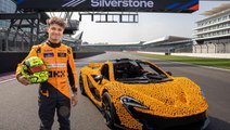 F1 star Lando Norris drives Lego McLaren car around Silverstone circuit