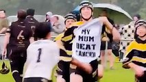 Teen rugby player celebrates try with t shirt which reads: 