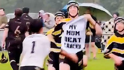 Teen rugby player celebrates try with t shirt which reads: "My mum beat cancer"
