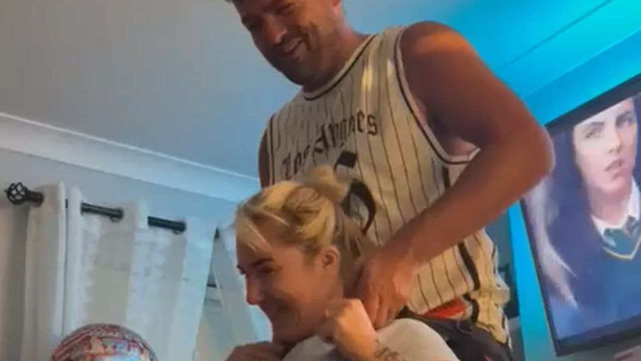 Joyful mishap: Playful attempt at a piggyback ride turns into a hilarious fall