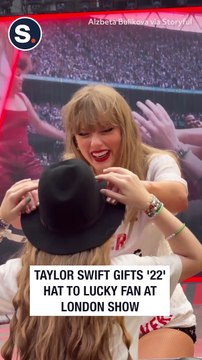 Taylor Swift Gifts '22' Hat to Lucky Fan at London Show