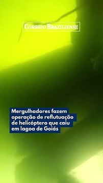 MERGULHADORES FAZEM OPERAÇÃO DE REFLUTUAÇÃO DE HELICÓPTERO QUE CAIU EM LAGOA DE GOIÁS