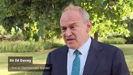 Sir Ed Davey knocks over line of blue dominoes