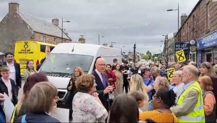 John Swinney heckled during campaign visit