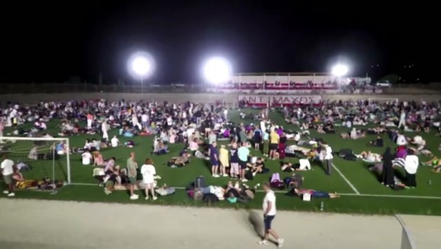 Tourists shelter in stadium after wildfire causes evacuations on Greek island of Kos