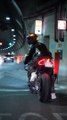 Motorcycle helmet with brake lights that sync with the bike