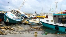 Category 5 hurricane leaves Caribbean islands bare, flooded, and damaged