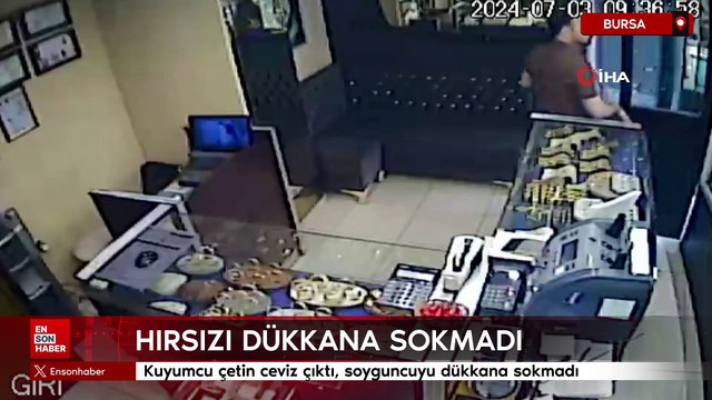 Bursa'da kuyumcu çetin ceviz çıktı, soyguncuyu dükkana sokmadı