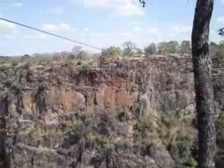 Flo doing the flying fox at the Victoria Falls