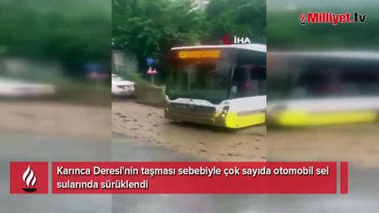 Bursa'da taşan dere araçları böyle önüne kattı