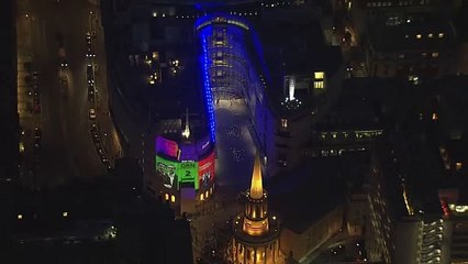 UK Election exit poll beamed onto BBC building