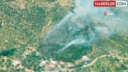 Evde çıkan yangın araziye sıçradı