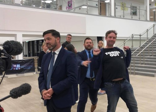 Conservative Stephen Crabb photobombed by ‘Tories out’ activist