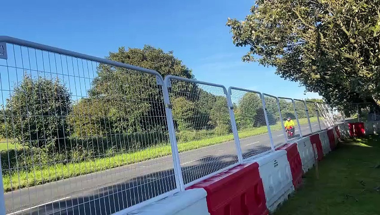 Bikes and sidecars stuck around the course returning to the paddock after the red flag incident during the Southern 100