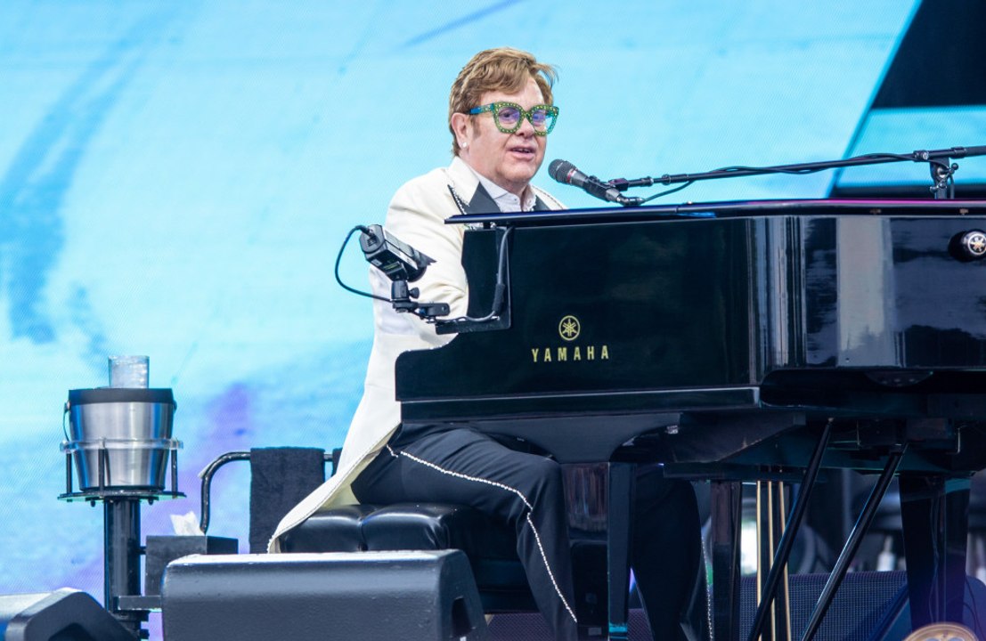 Sir Elton John peed in an empty bottle while at a shoe shop in France